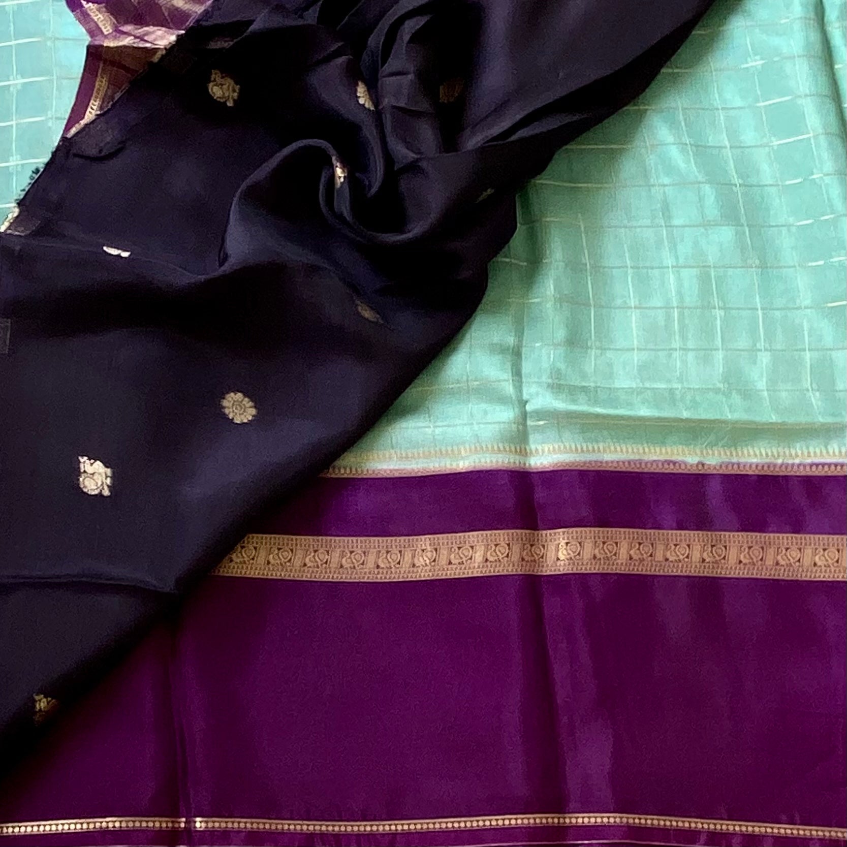 Mint Green soft crepe with deep Purple Gold Checked Pallu
