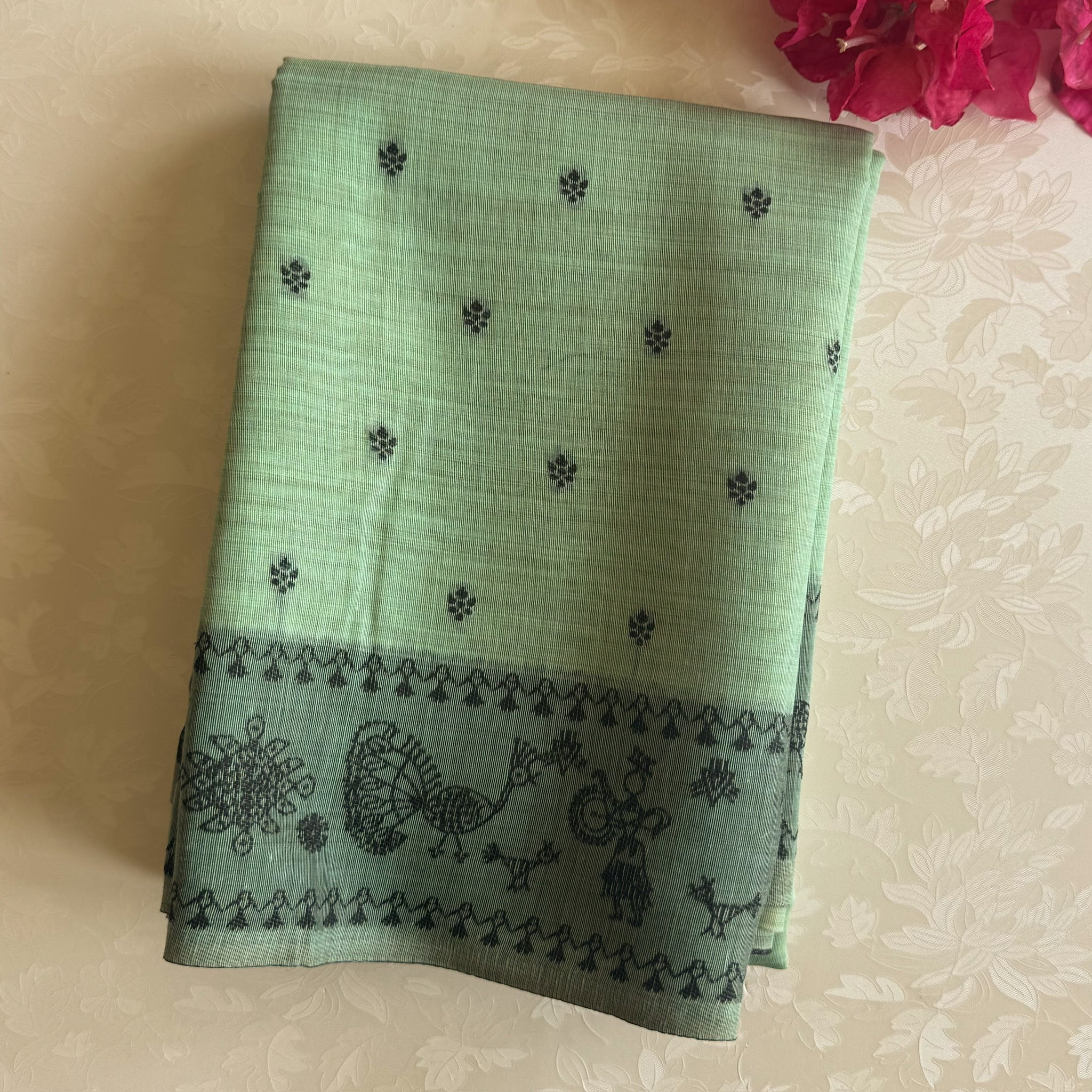 Mint Green Village Motif Saree With Peacock Border And Tassels