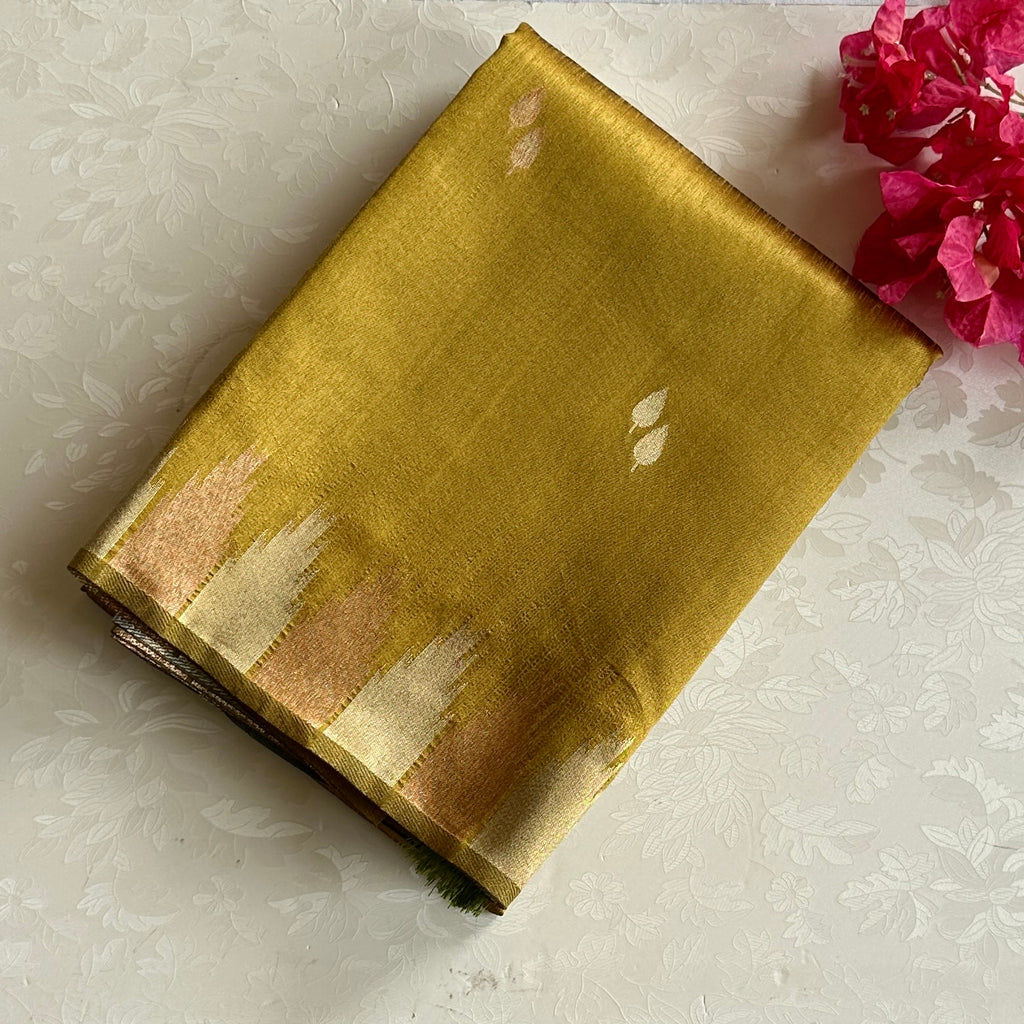 Mustard gold soft tussar with olive green ikkat pallu & temple borders