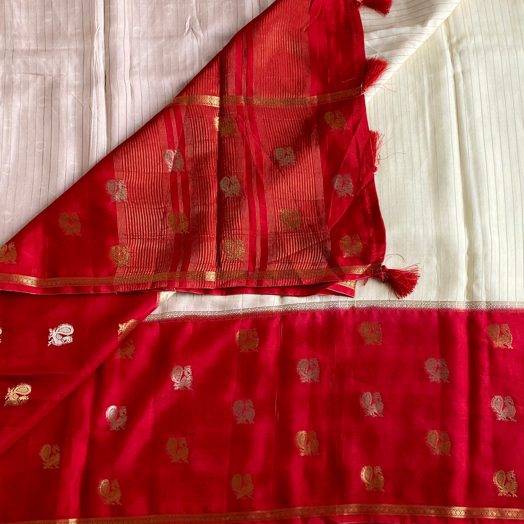 Ivory Soft Crepe Silk With Crimson Red Pallu & Peacock Long Borders