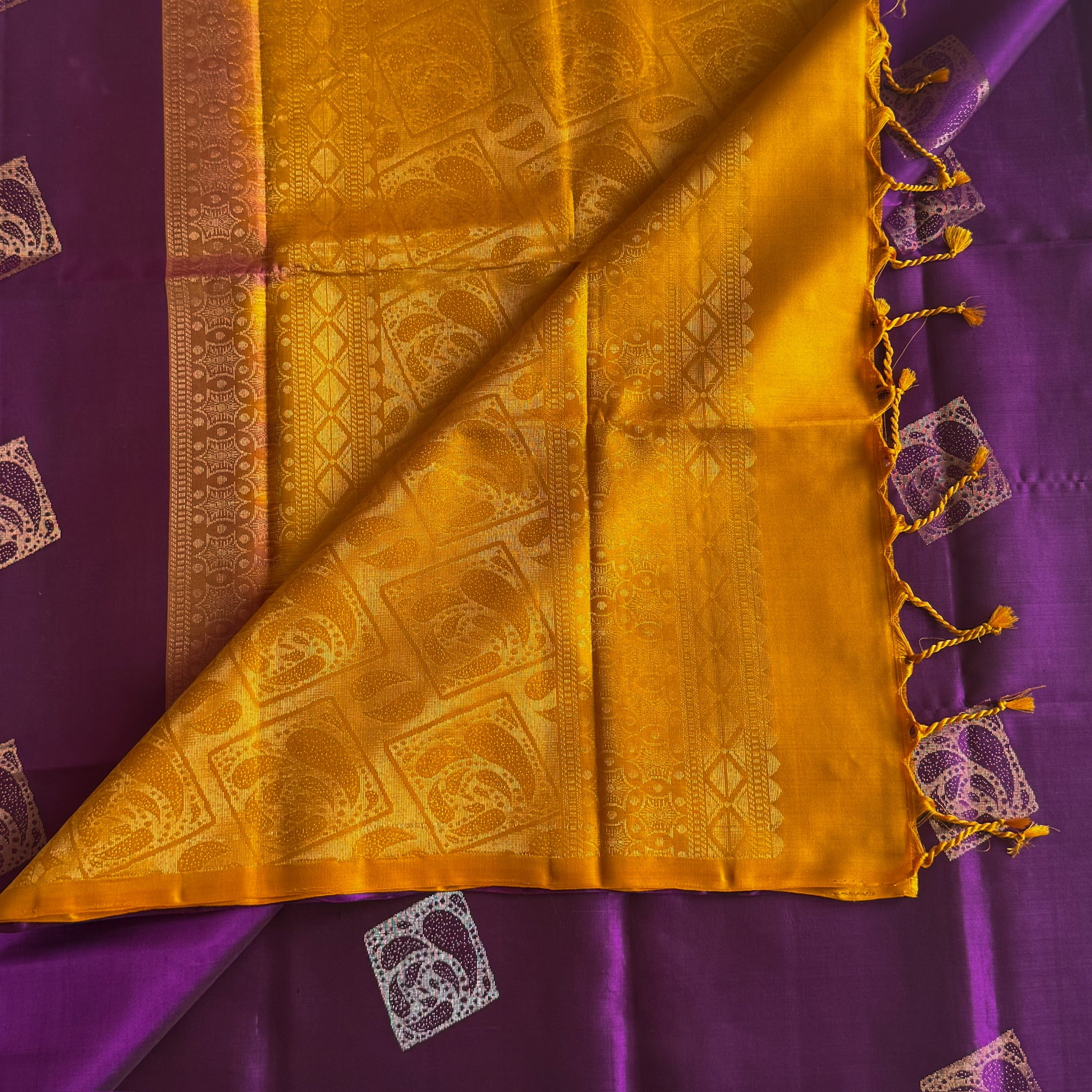 Elegant Purple Gold Woven Saree With Paisley Motifs And Tassels
