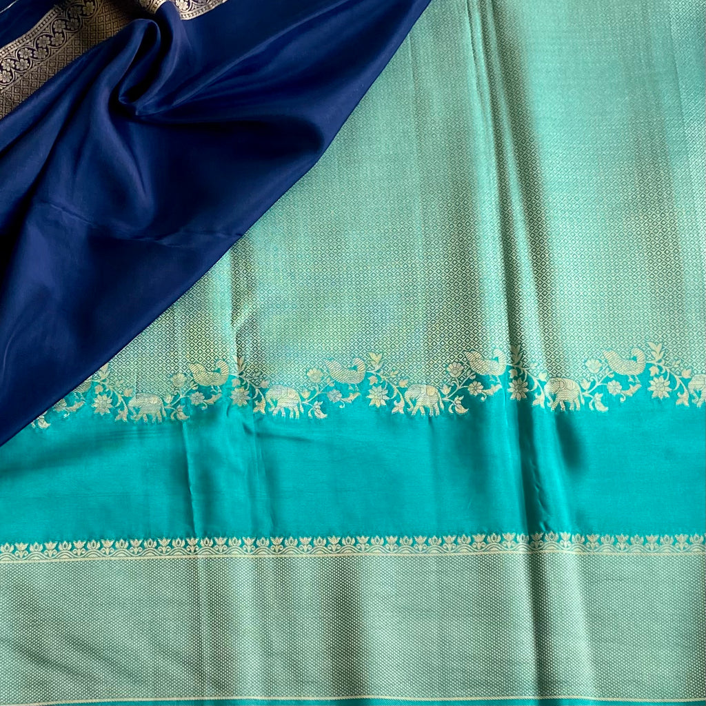 Teal Blue Soft Crepe Silk Saree With Navy Blue Border