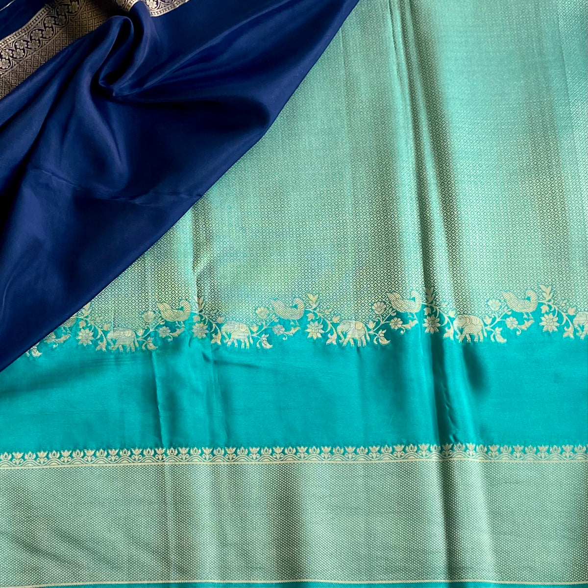 Teal Blue Soft Crepe Silk Saree With Navy Blue Border