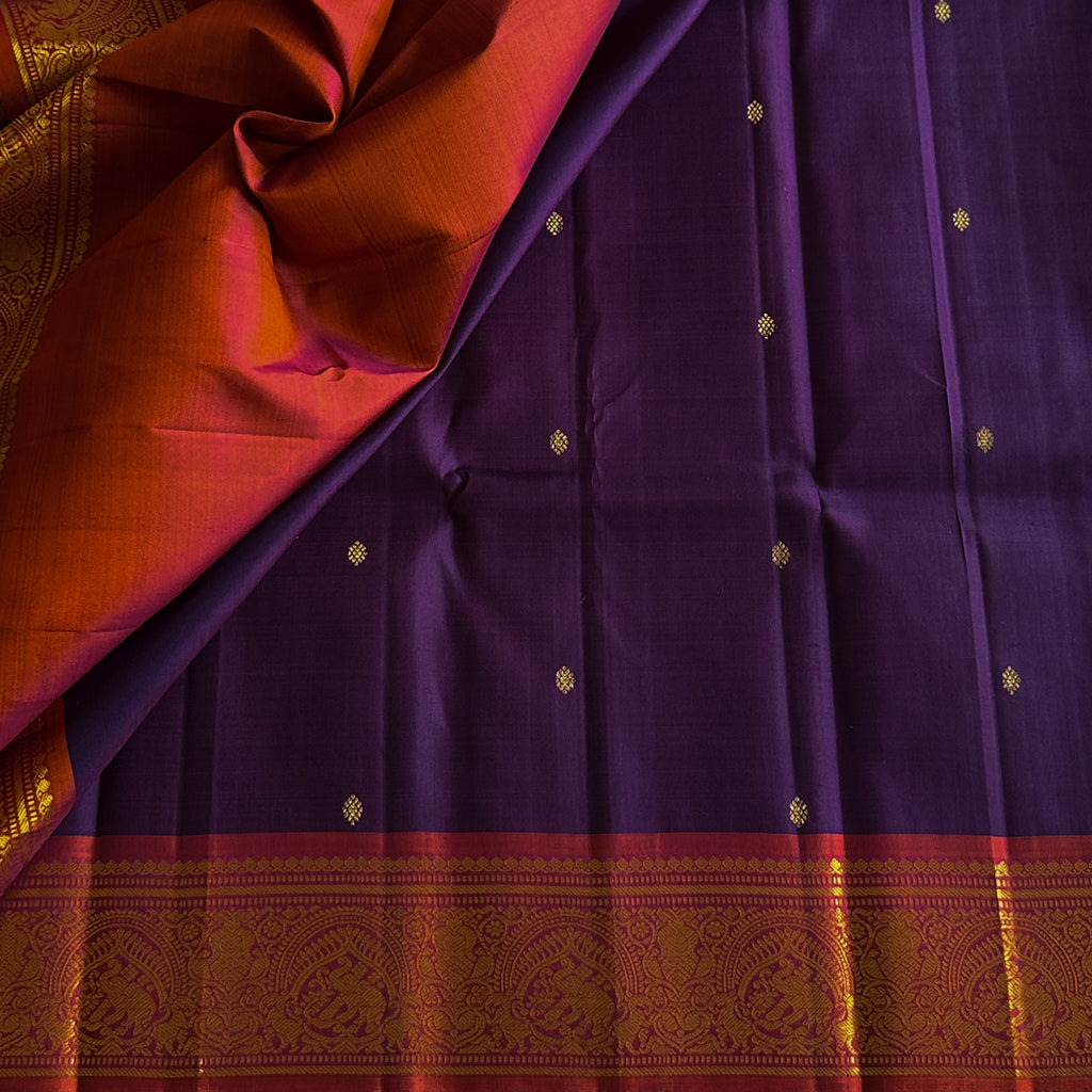 Elegant purple with dual shaded rust orange Kanjeevaram stunner
