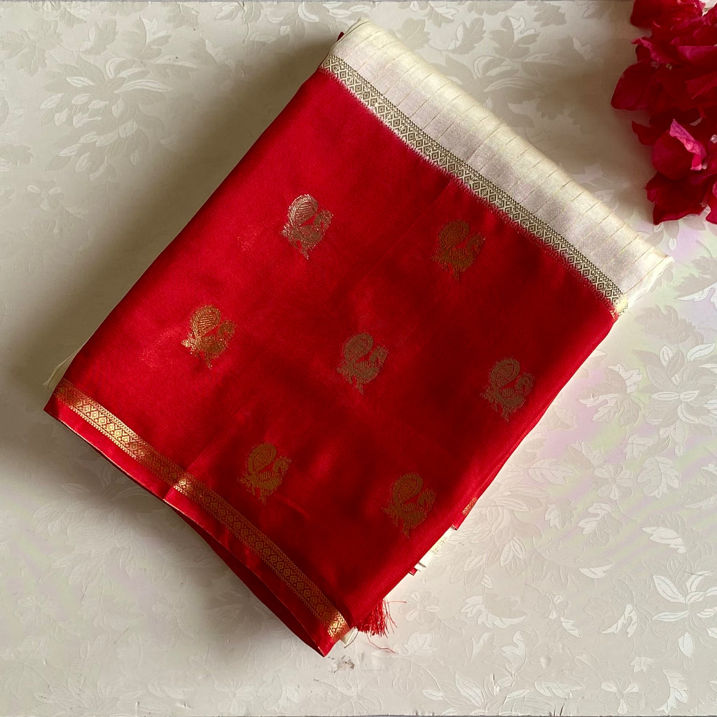 Ivory Soft Crepe Silk With Crimson Red Pallu & Peacock Long Borders