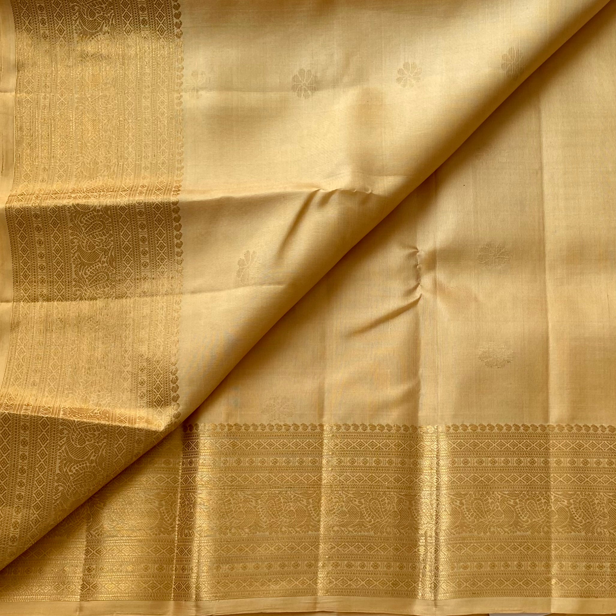 Traditional Champagne Gold Woven Zari Saree With Intricate Jacquard Border