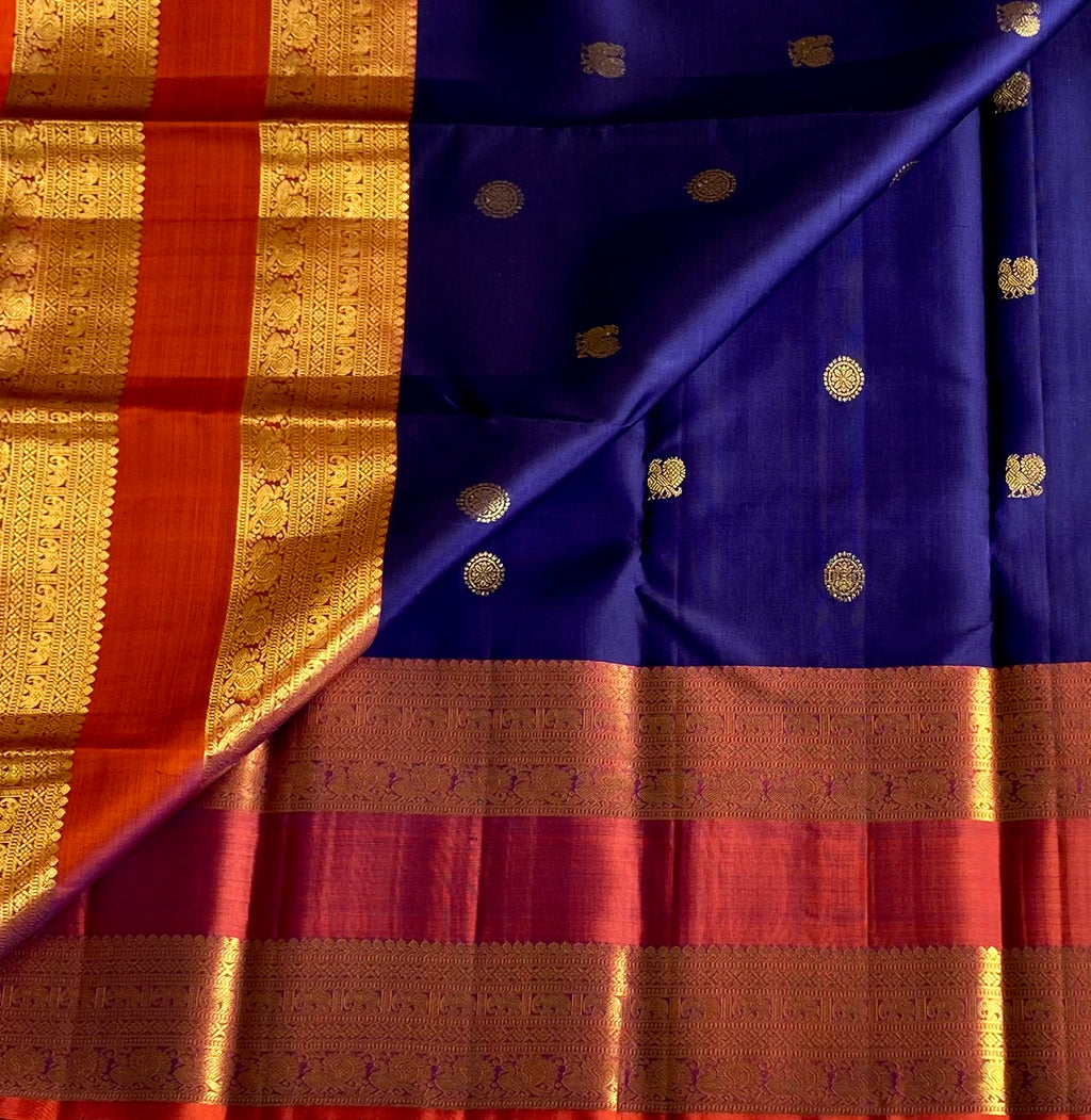 Master weave Rich Blue with dual shaded rust retta pett borders Kanjeevaram stunner