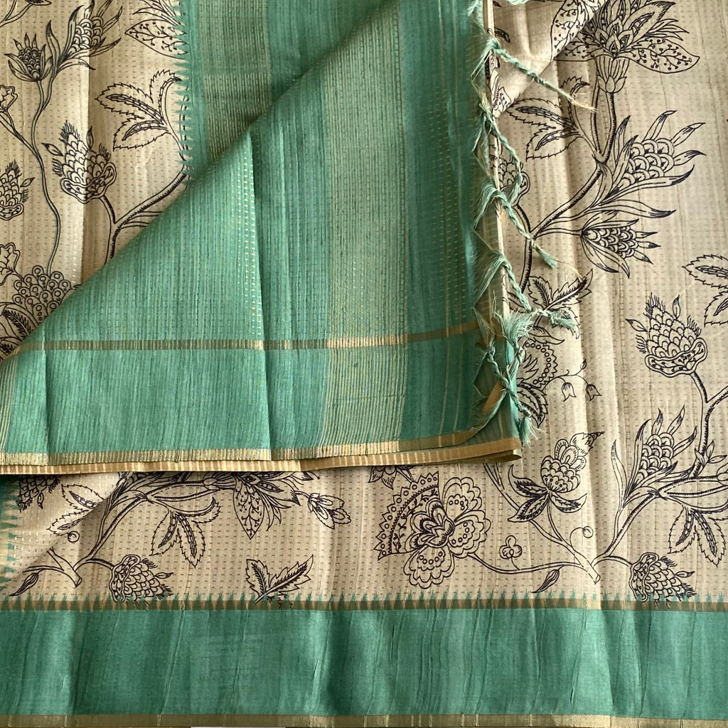 Beige Soft Tussar Silk Saree With pastel Teal Green Pallu And Gold Border