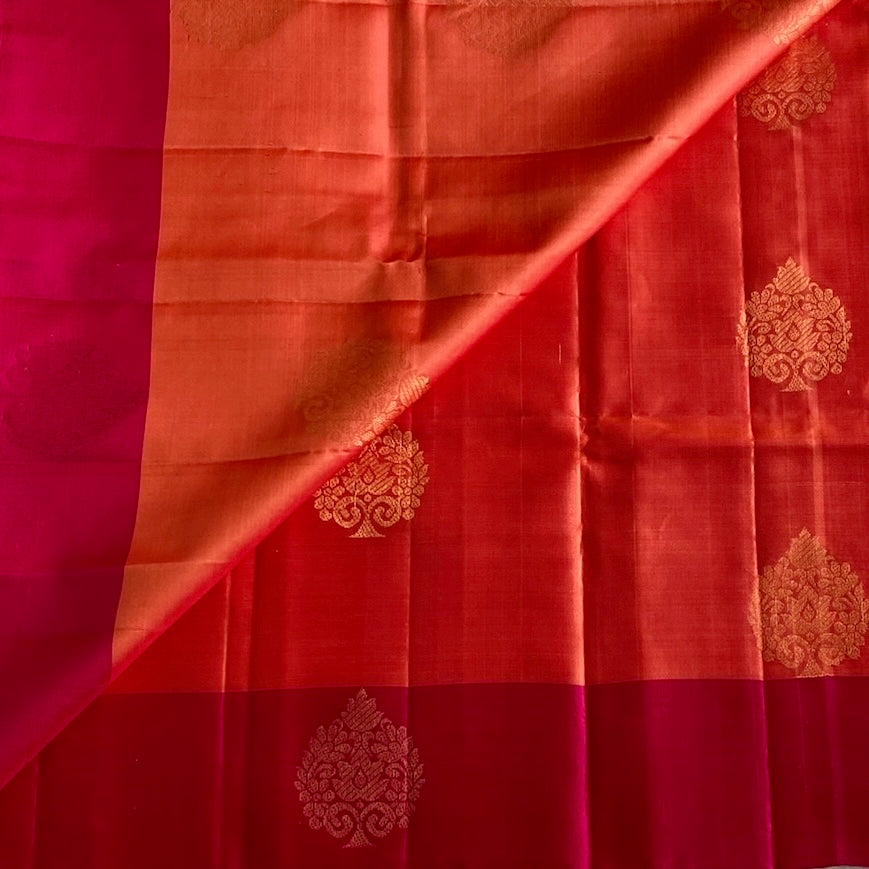 Kanakambari Orange Designer Pure Silk With Rani Pink Pallu