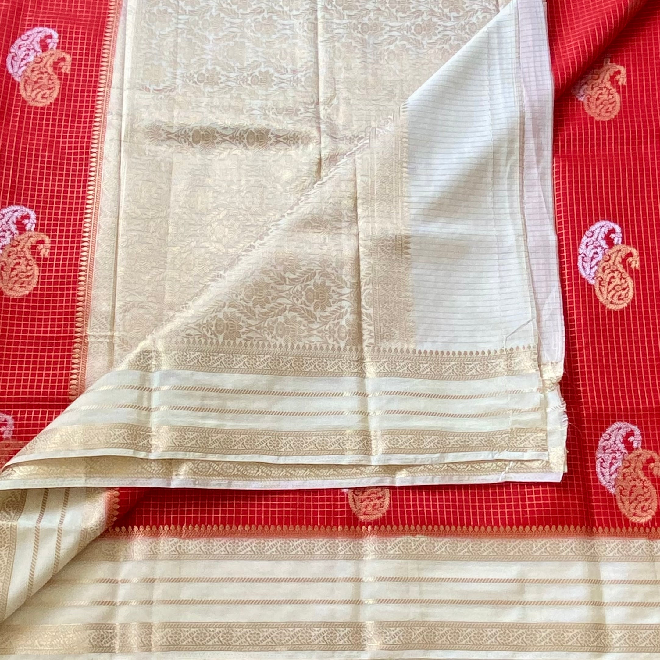 Orangish Red with pearl white soft crepe with double paisley buttas