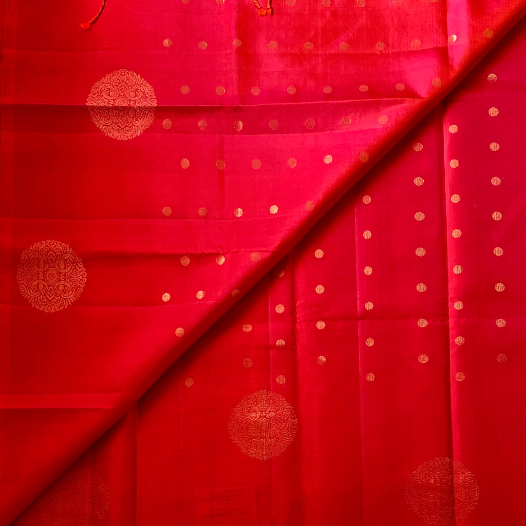 Kanakambari pinkish red Silk Saree Gold Medallion Paisley Pallu Tasseled End