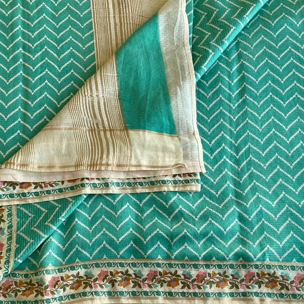 Turquoise Soft Tussar Silk Saree With Cream Floral Border
