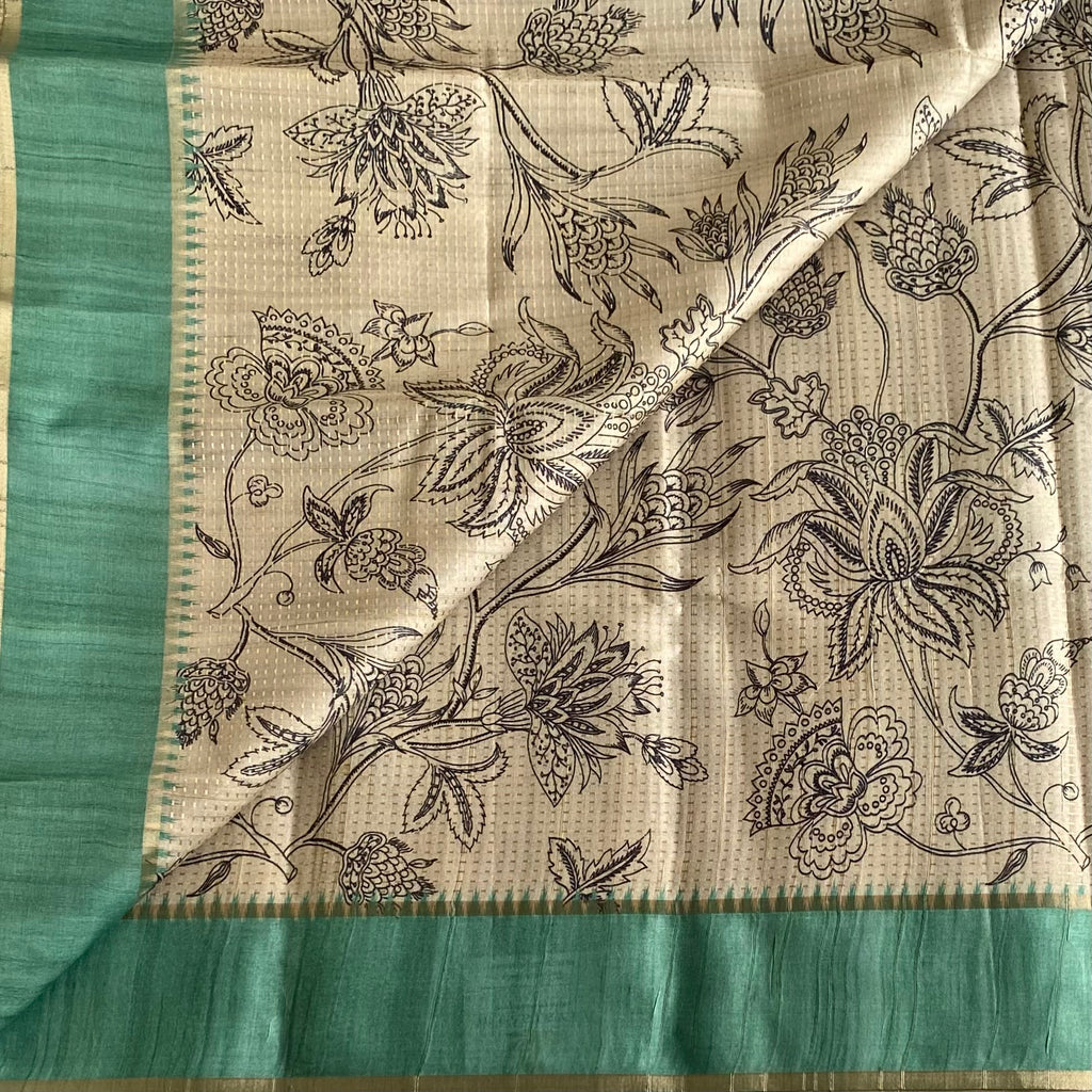 Beige Soft Tussar Silk Saree With pastel Teal Green Pallu And Gold Border
