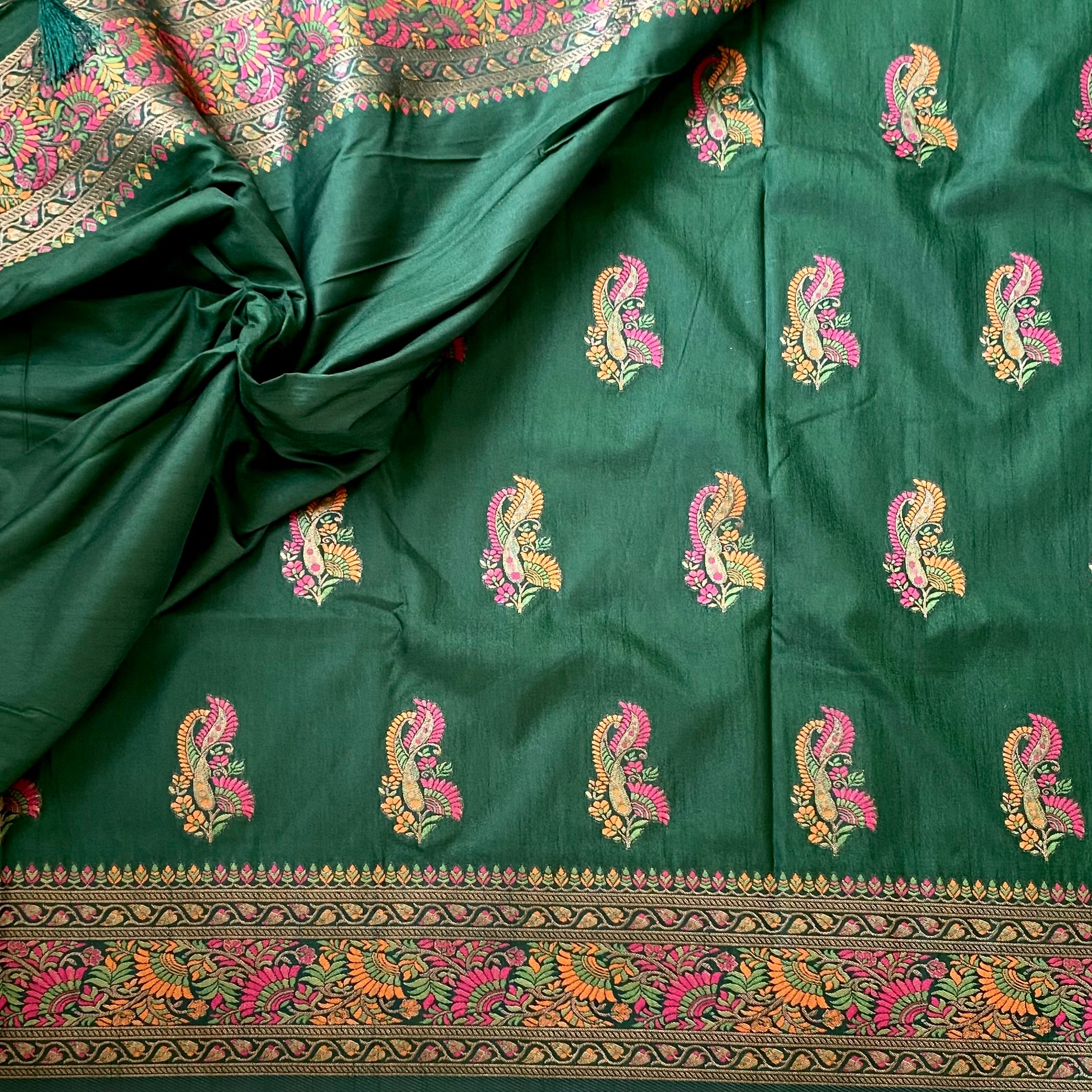 Emerald green with Meenakari woven(not printed) soft tussar with rich pallu