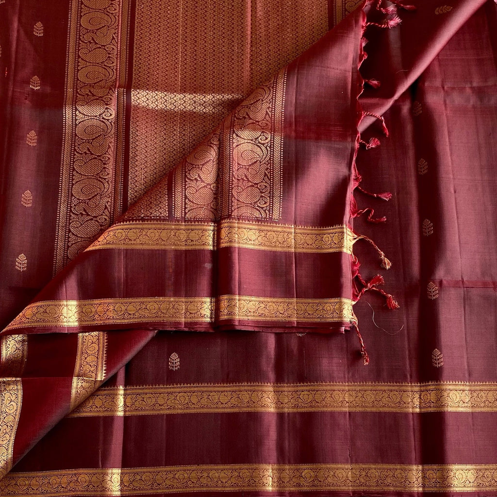 Burgundy Designer Pure Silk Saree With Gold Zari Borders And Paisley