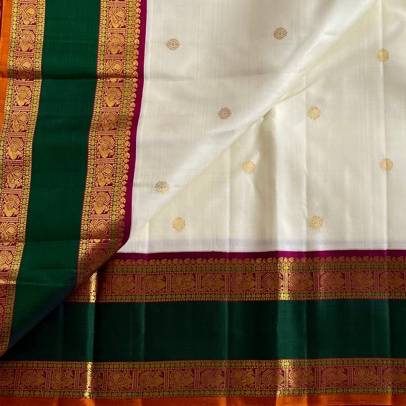 Classy Pearl White With Emerald Green Pure Zari Kanjeevaram Stunner