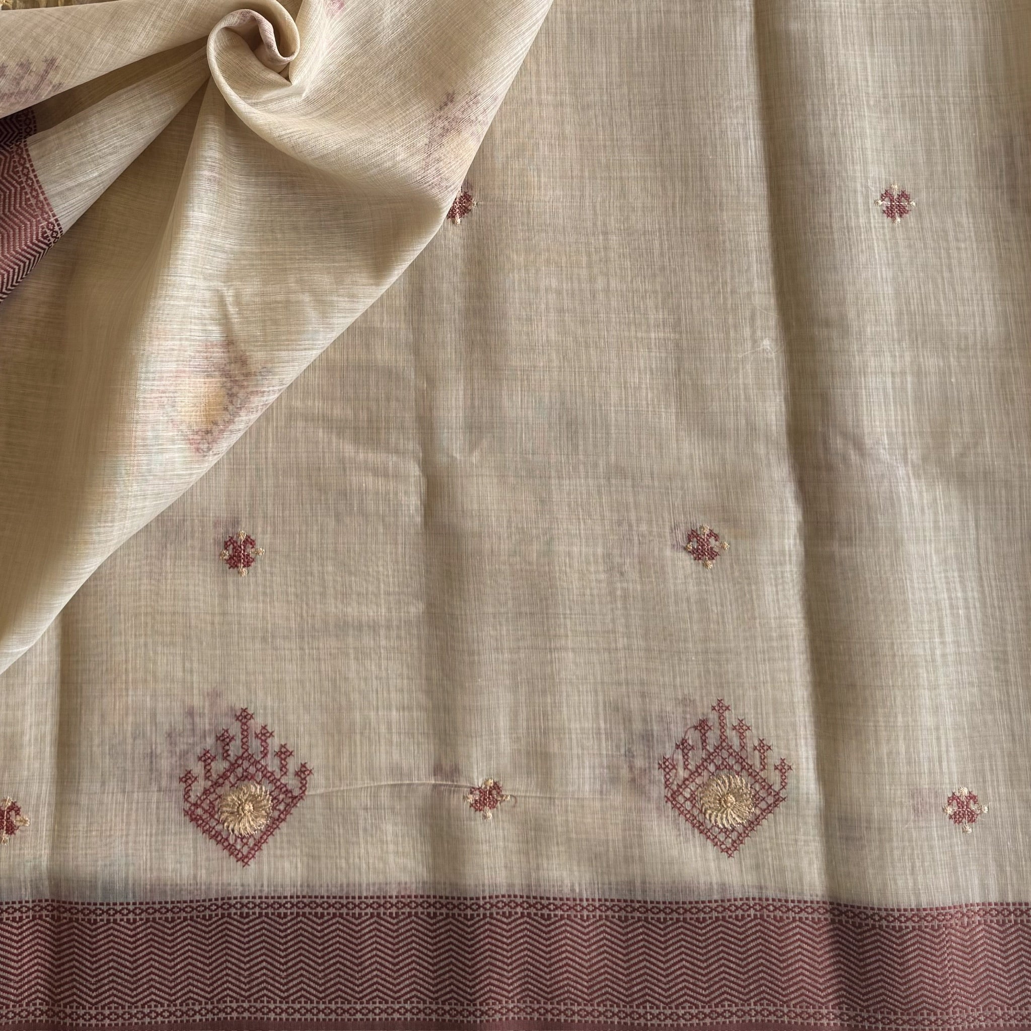 Elegant Pale Beige Saree With Maroon Motifs Gold Zari Border