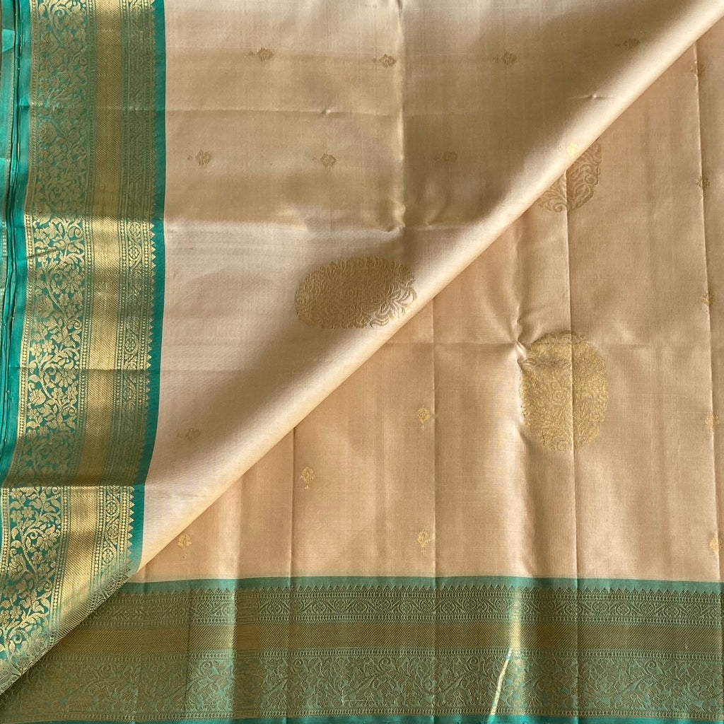 Pastel Beige Designer Pure Silk Saree With Sea Green Pallu