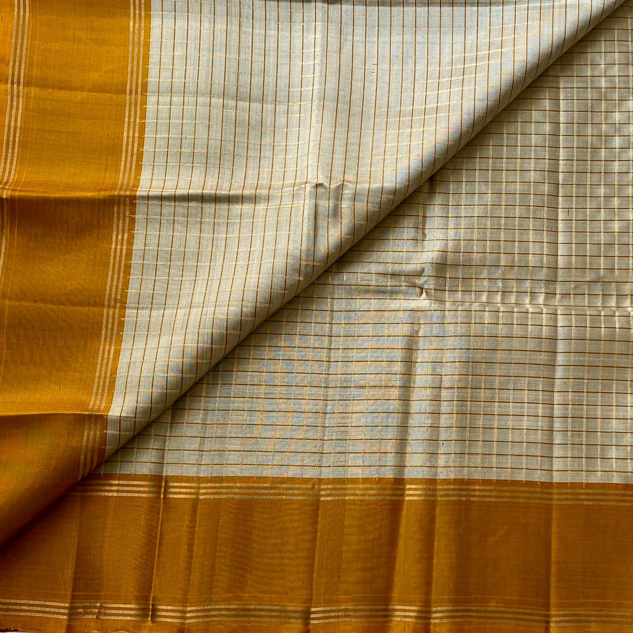 Metallic Amber Silk Saree Pale Silver Checked Pallu Gold Border