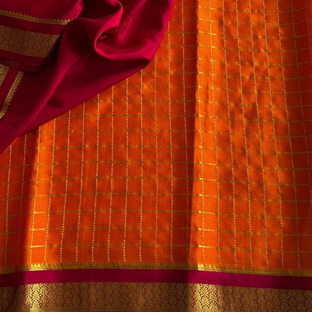 Tangerine Silk Checked Saree With Gold Brocade Magenta Border Traditional