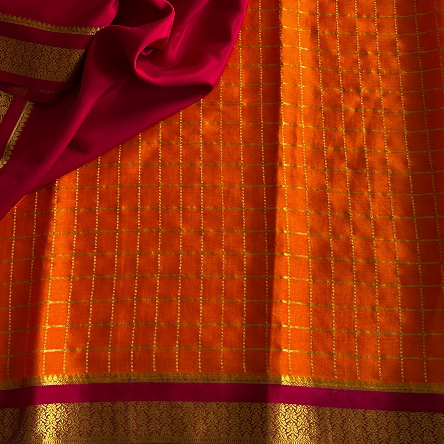 Tangerine Silk Checked Saree With Gold Brocade Magenta Border Traditional