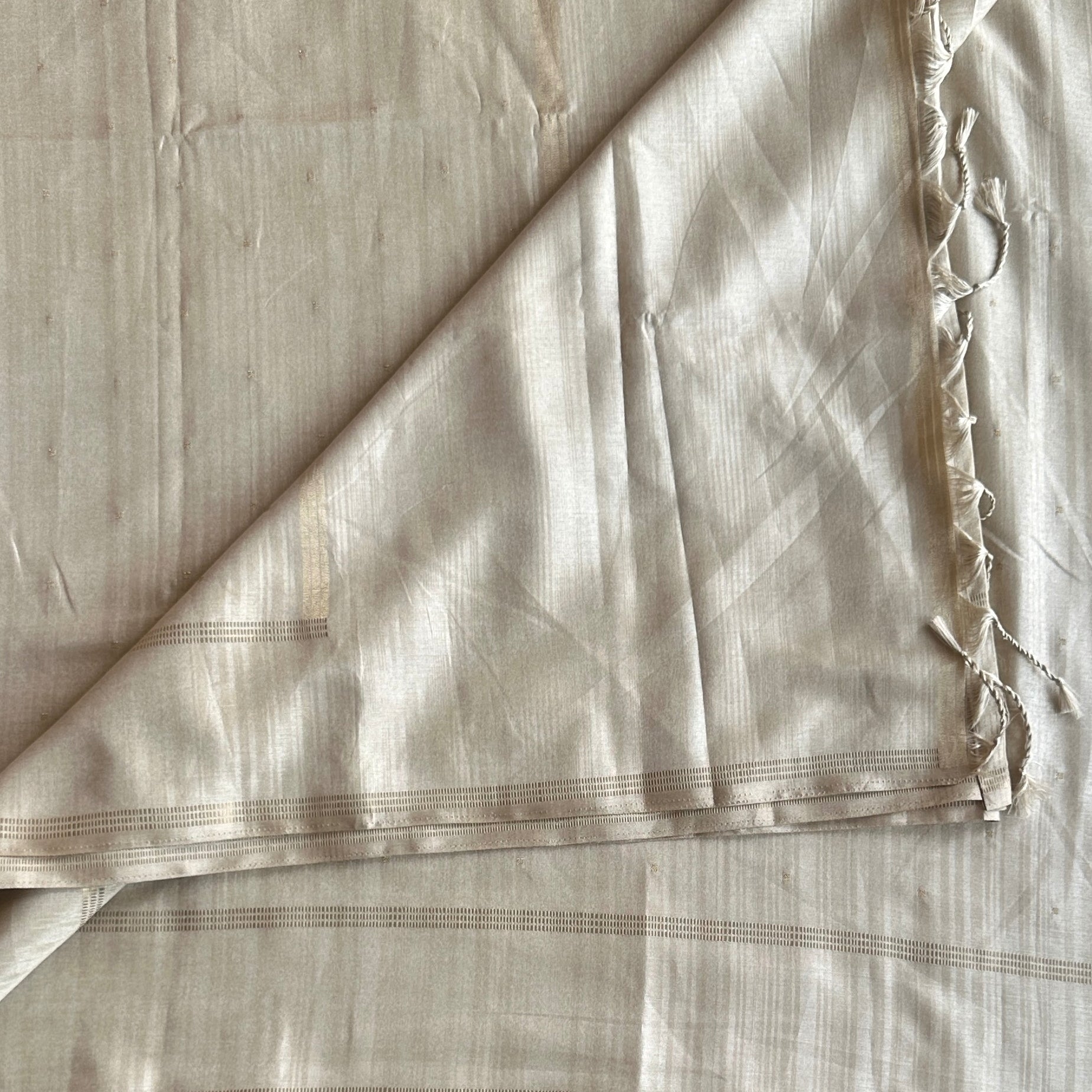 Champagne Beige Saree With Gold Buti And Thin Zari Border