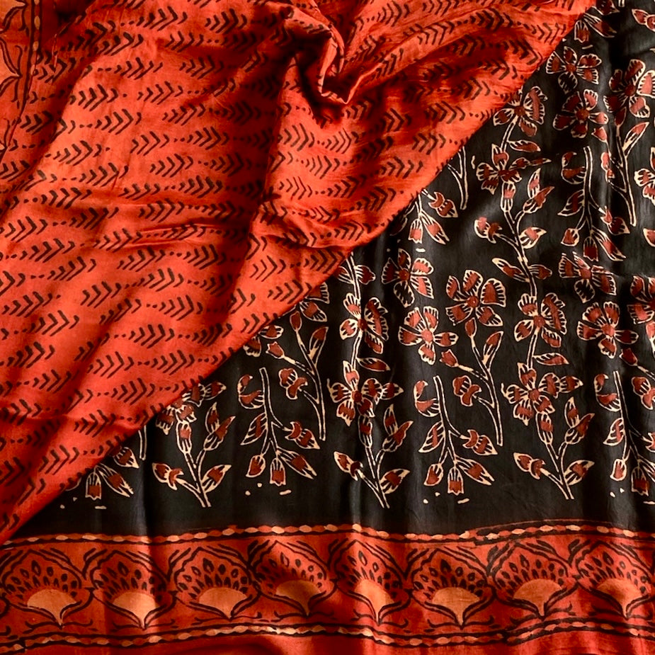 Jet Black Ajrakh Handblock Printed Silk Saree With burnt orange