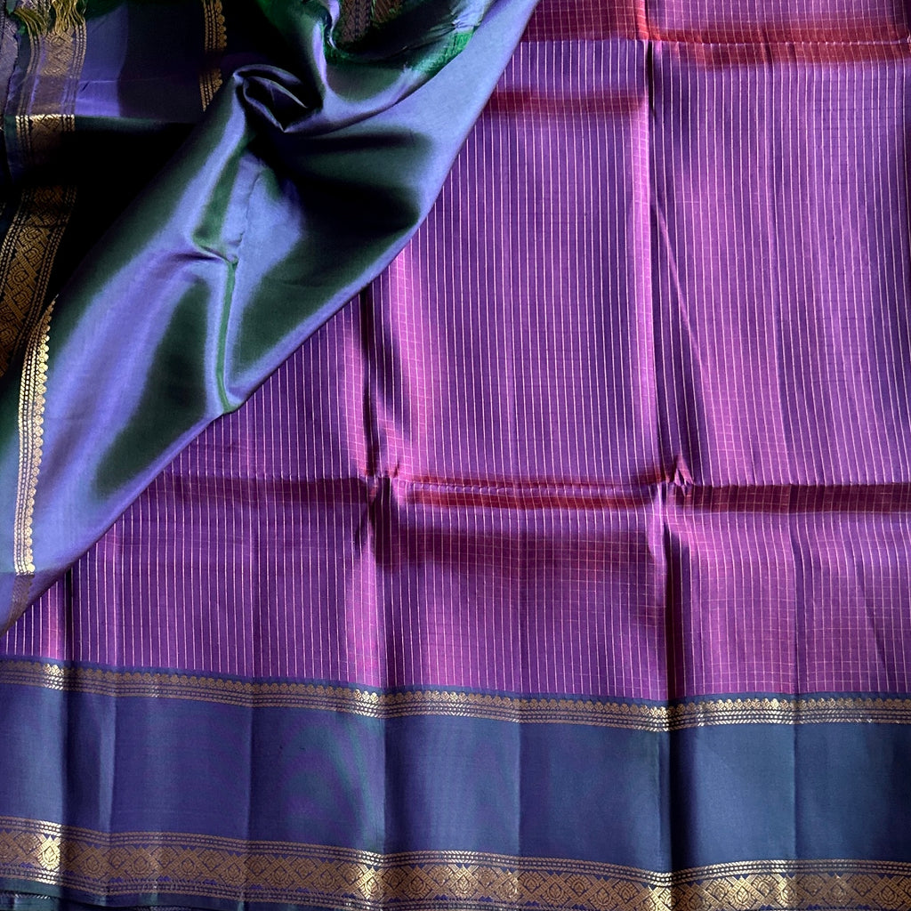 Elegant Violet Magenta Saree with Gold Paisley Border and Tassels
