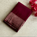 Plum soft tussar with rich Paisley Pallu and woven blouse