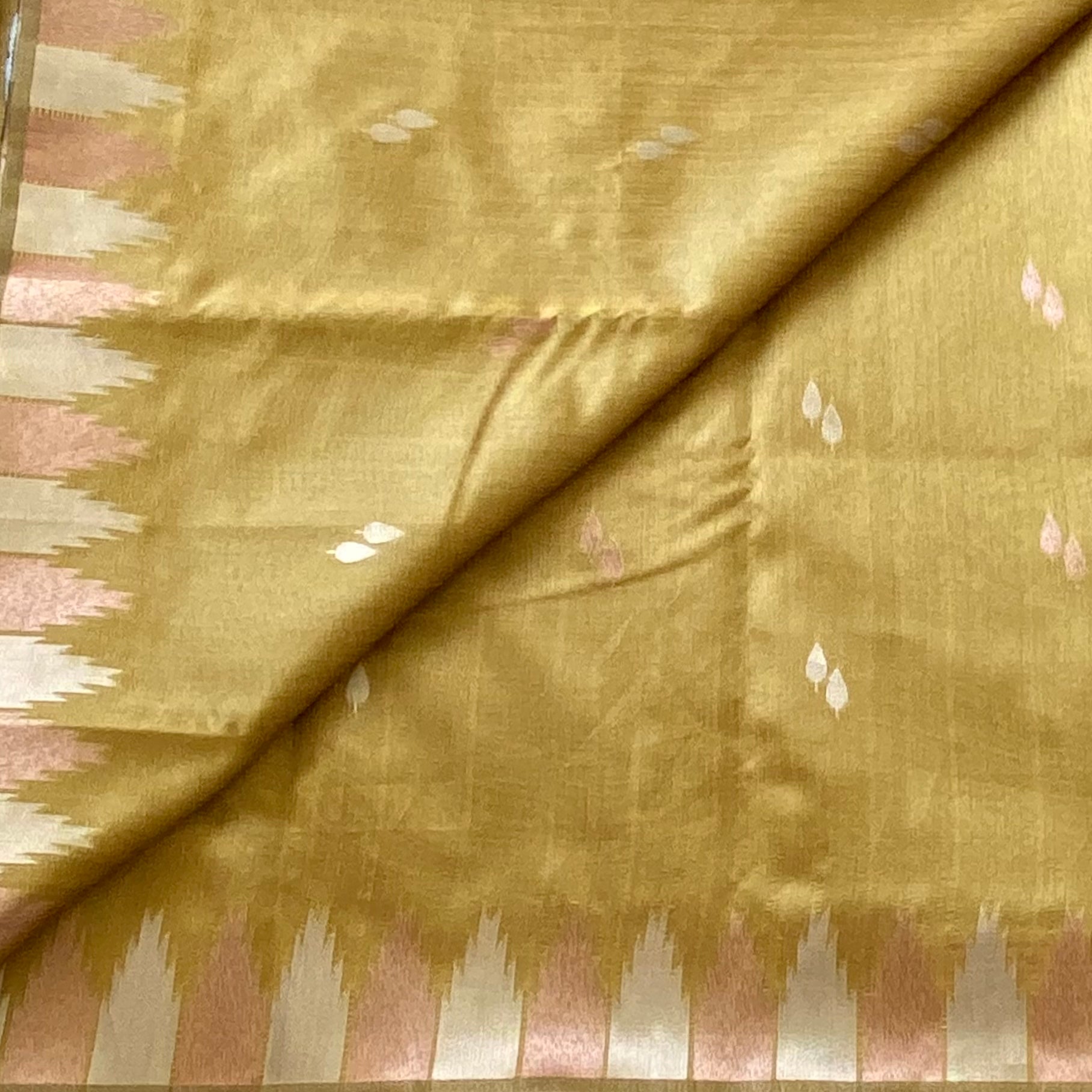 Mustard gold soft tussar with olive green ikkat pallu & temple borders