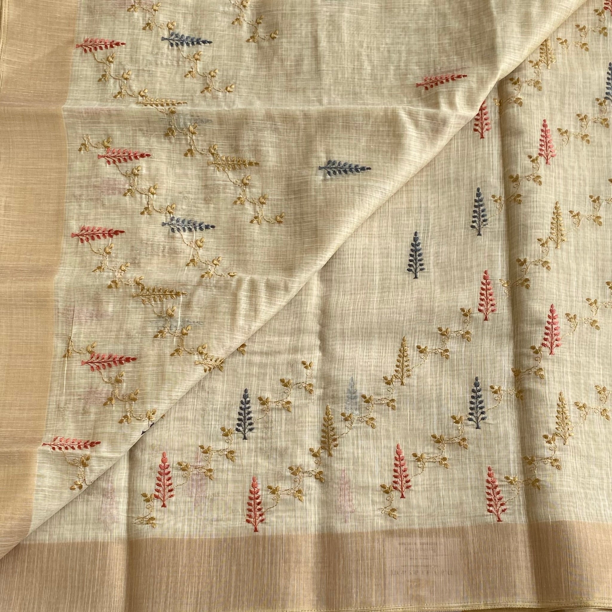 Light Beige Lightweight Tussar Embroidered Motifs With Tan Border Tassels