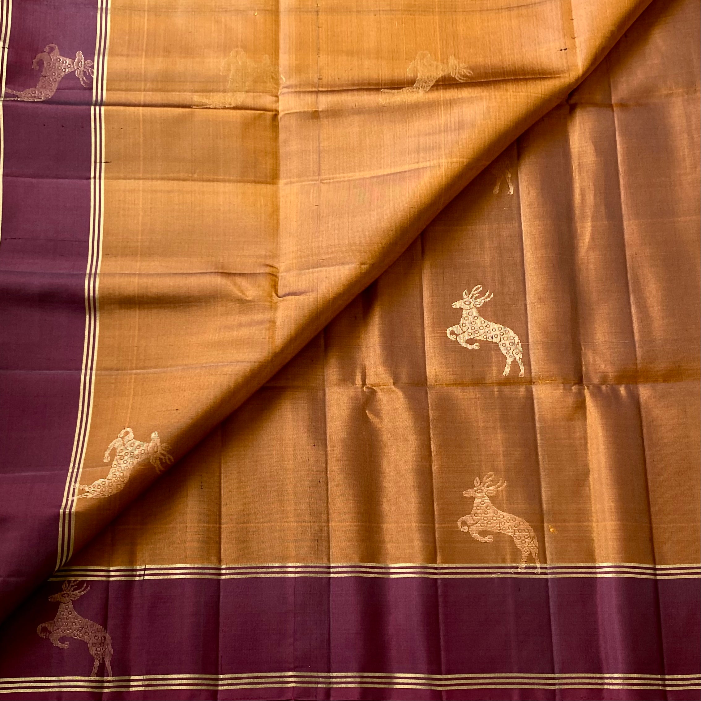 Magical rust with wine, maroon designer pure silk with dear motifs