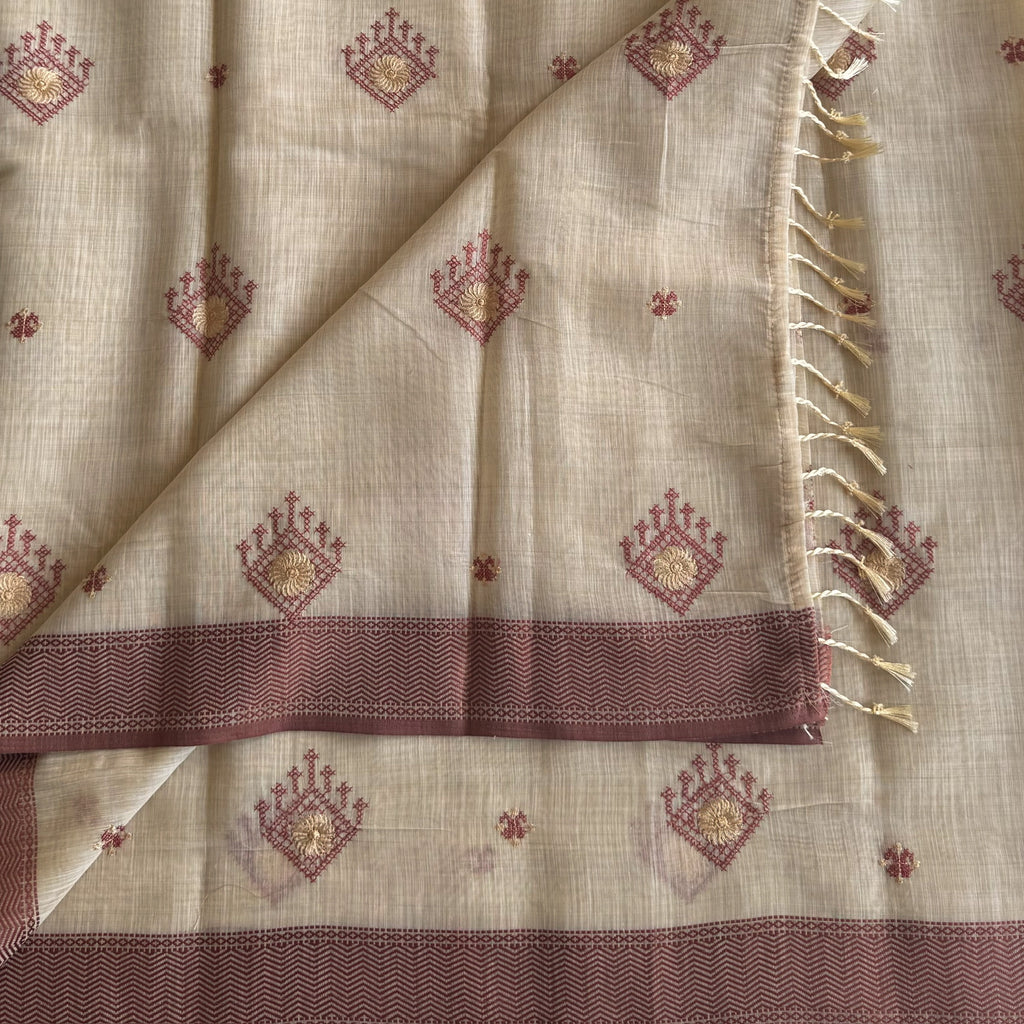 Elegant Pale Beige Saree With Maroon Motifs Gold Zari Border