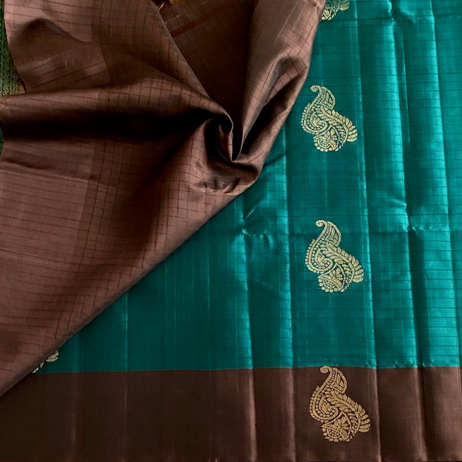 Teal Designer Pure Silk With Chocolate Brown Pallu And Gold Buttas