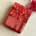 Lustrous Red Meenakari woven tussar with floral weave all over