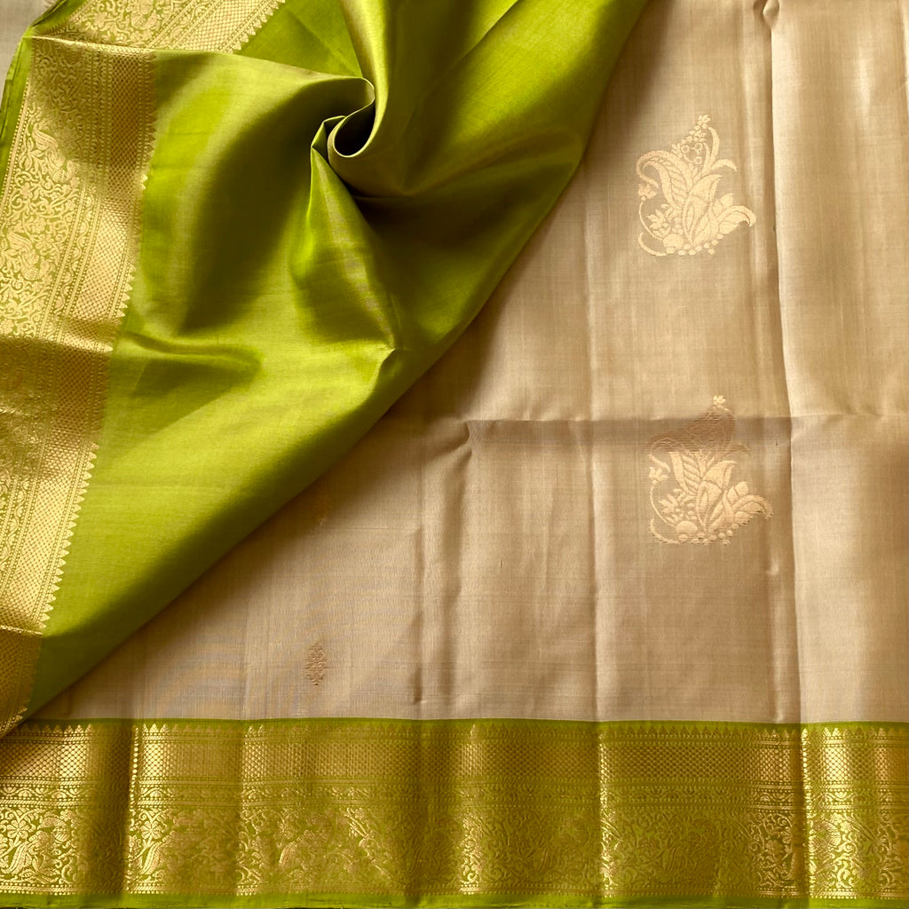Elegant Pale Beige Lime Green Zari Woven Floral Traditional Saree