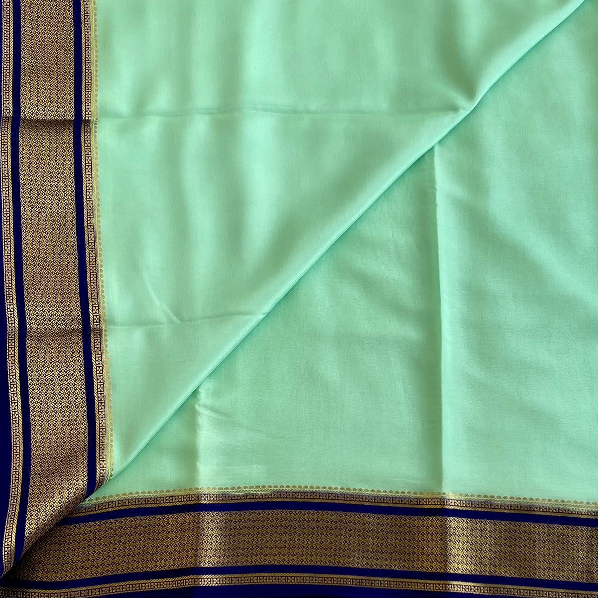 Sea Green With Rich Navy Blue Mysore Crepe Silk Saree With Antique Gold Borders