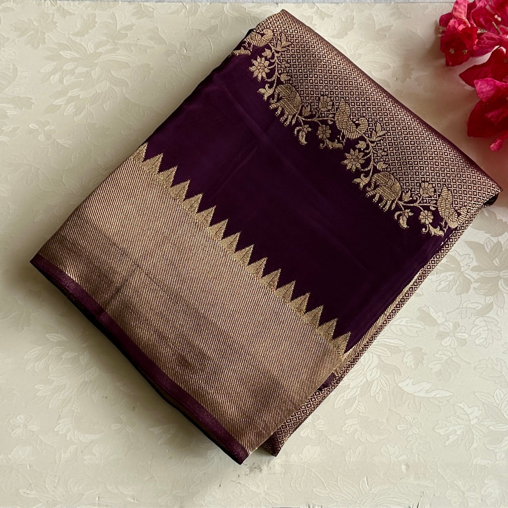 Designer Brocade soft crepe with antique gold n deep plum.