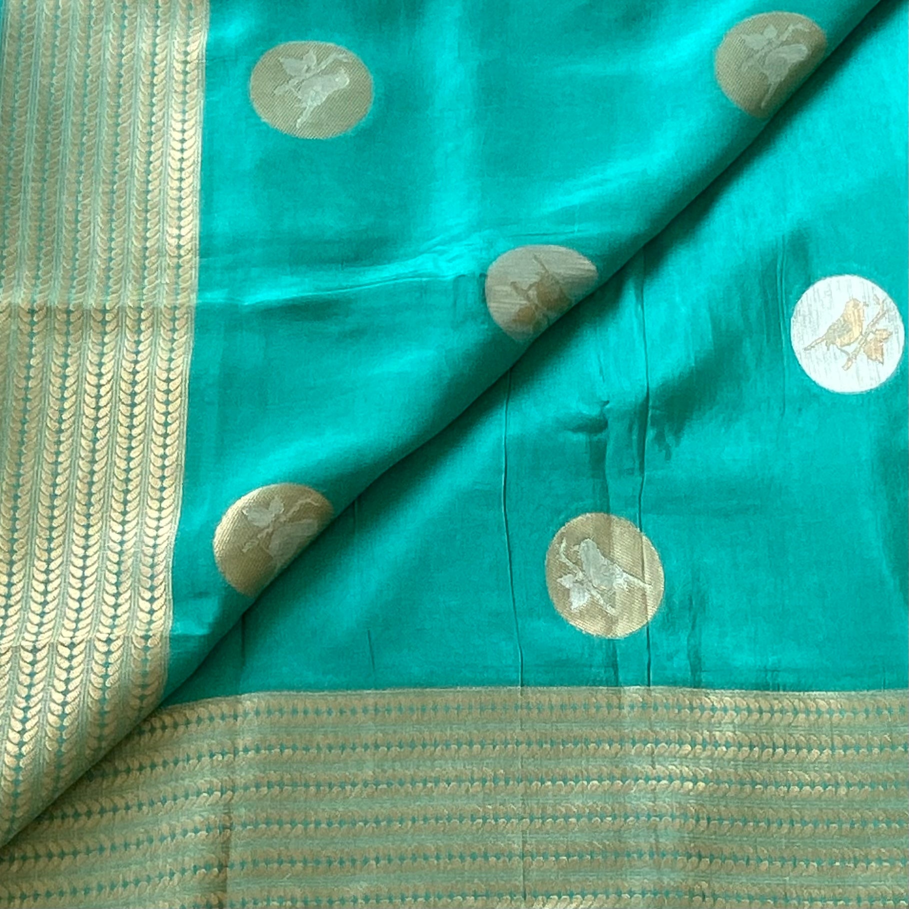 Gorgeous Sea blue designer soft crepe silk with zari buttas