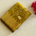 Olive Green Brocade Floral Saree With Gold Border Tassel Pallu