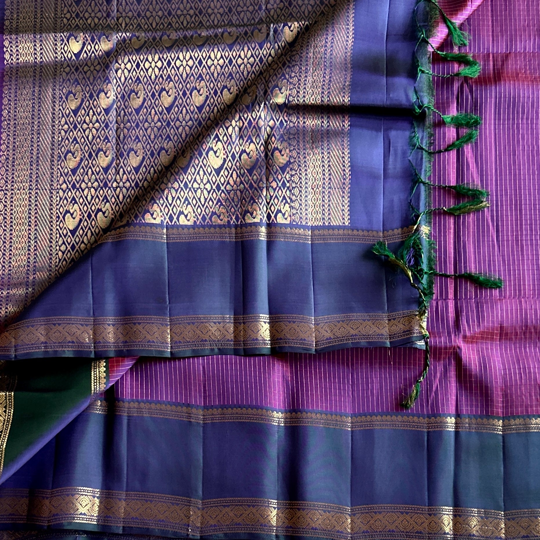 Elegant Violet Magenta Saree with Gold Paisley Border and Tassels