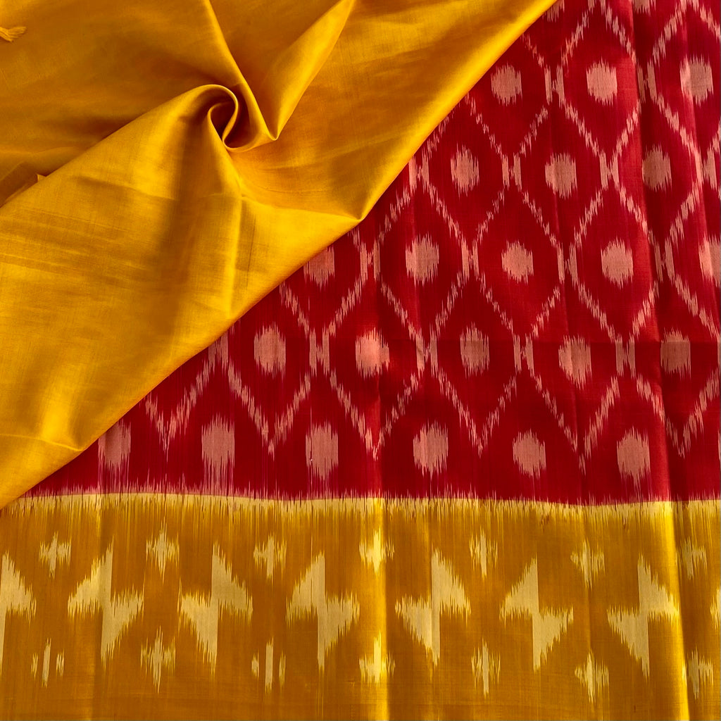 Reddish Pink Designer Pure Ikkat Silk With Saffron Yellow Pallu