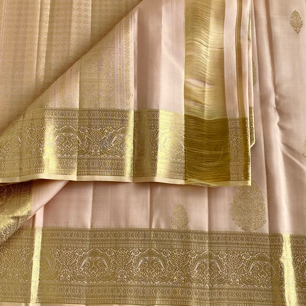 Blush Ivory Pearl Kanjeevaram Pure Zari Silk With Metallic Gold Border