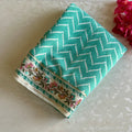 Turquoise Soft Tussar Silk Saree With Cream Floral Border