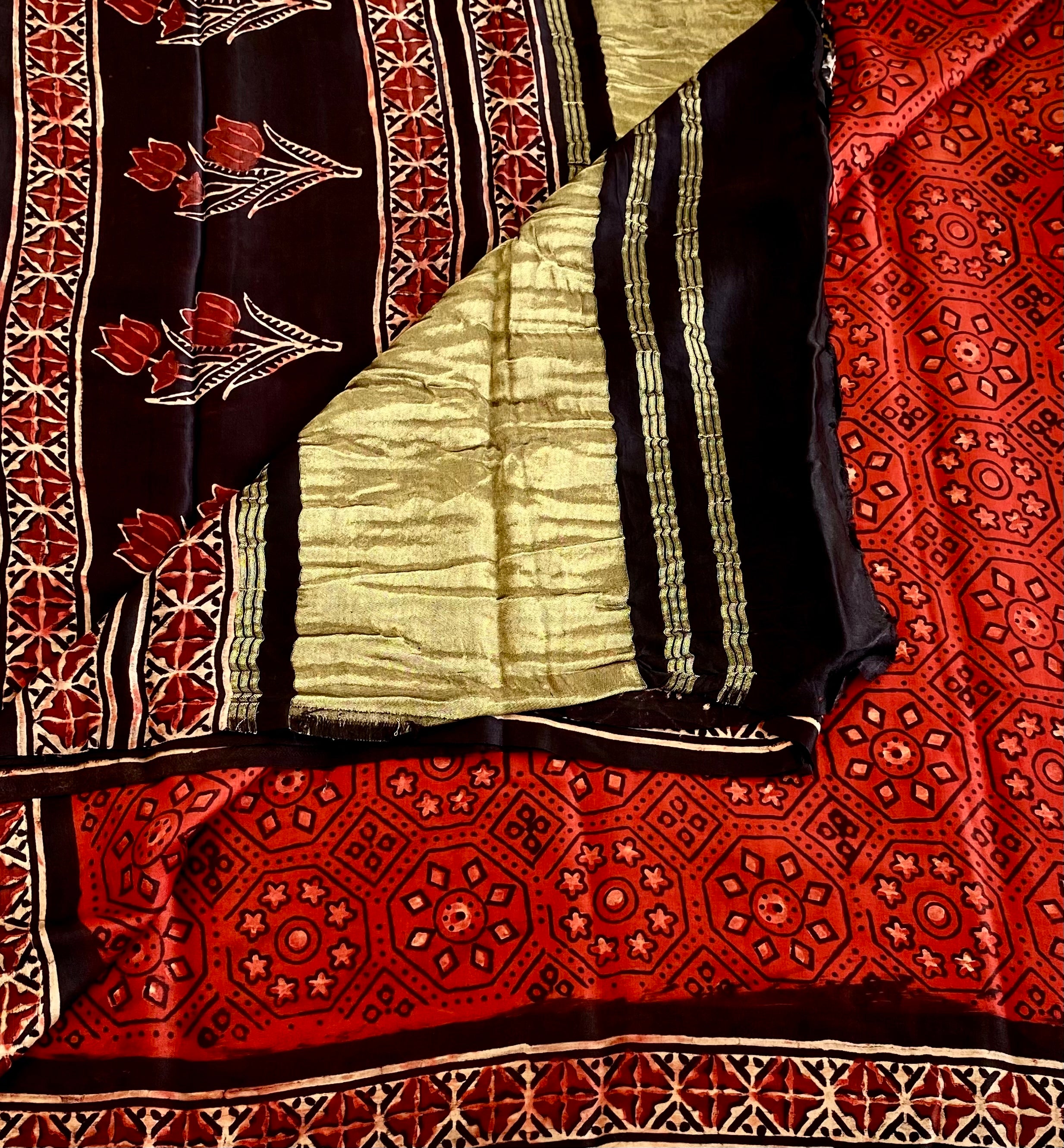 Rust Red And Jet Black Ajrakh Handblock Printed Silk With Gold Zari Pallu