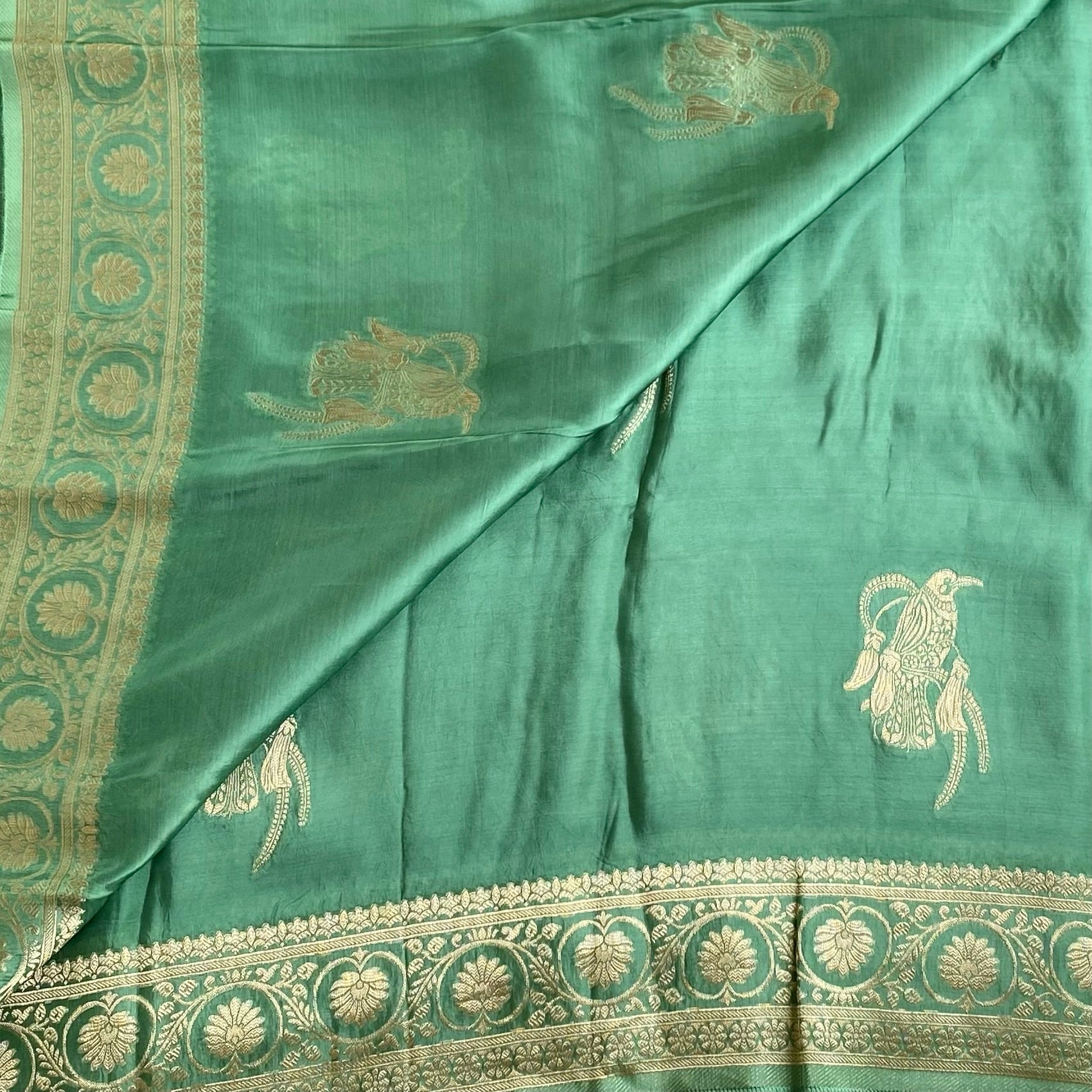 Teal Green Soft Crepe Silk Saree With Scarlet Red Blouse