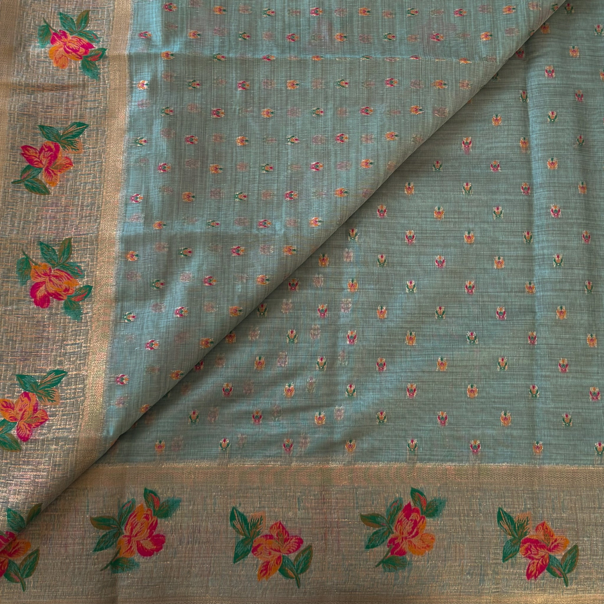 Festive Elegant Mint Green Floral Saree With Gold Zari Tassels