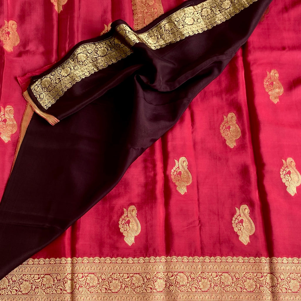 Peachish Pink Soft Crepe Silk Saree With Gold Zari Border & Wine Blouse