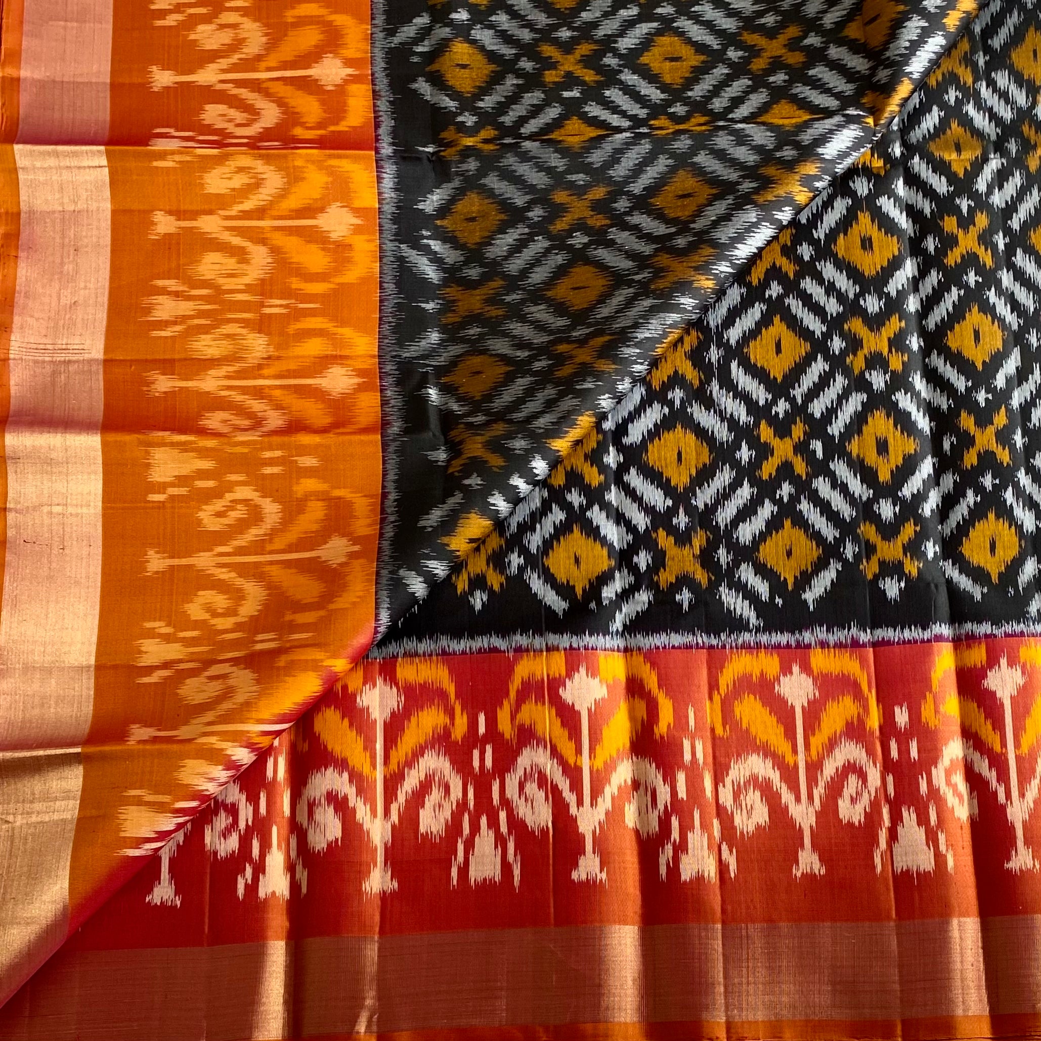 Stunner Black with Burnt Orange Ikkat Handwoven Pure Silk