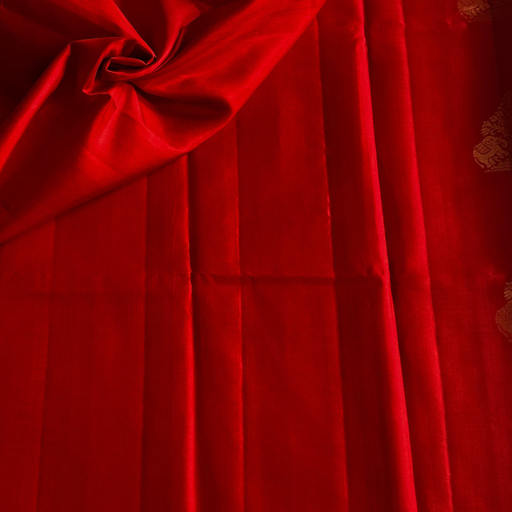 Scarlet Red Saree with Gold Woven Motifs and Tassels